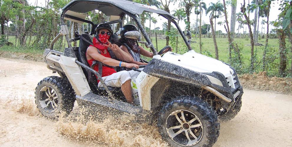 Couple on a dirt road ATV tour