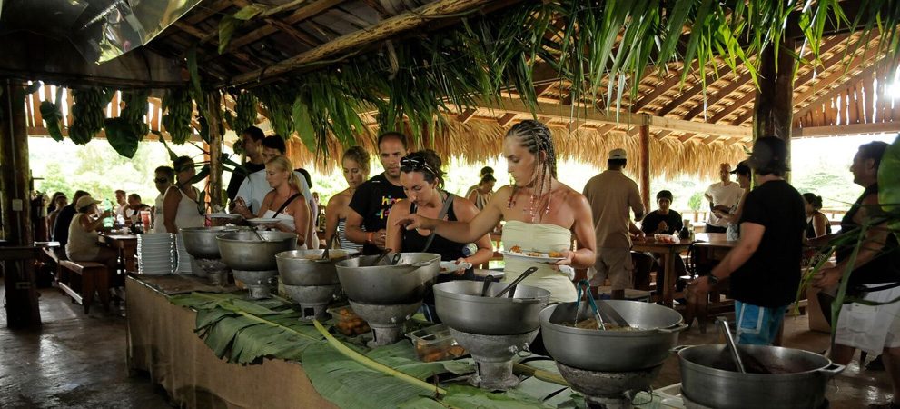 tourist having lunch of delicious local cuisine buffet