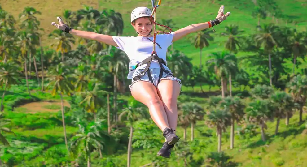 Guy enjoying the view from a zip line