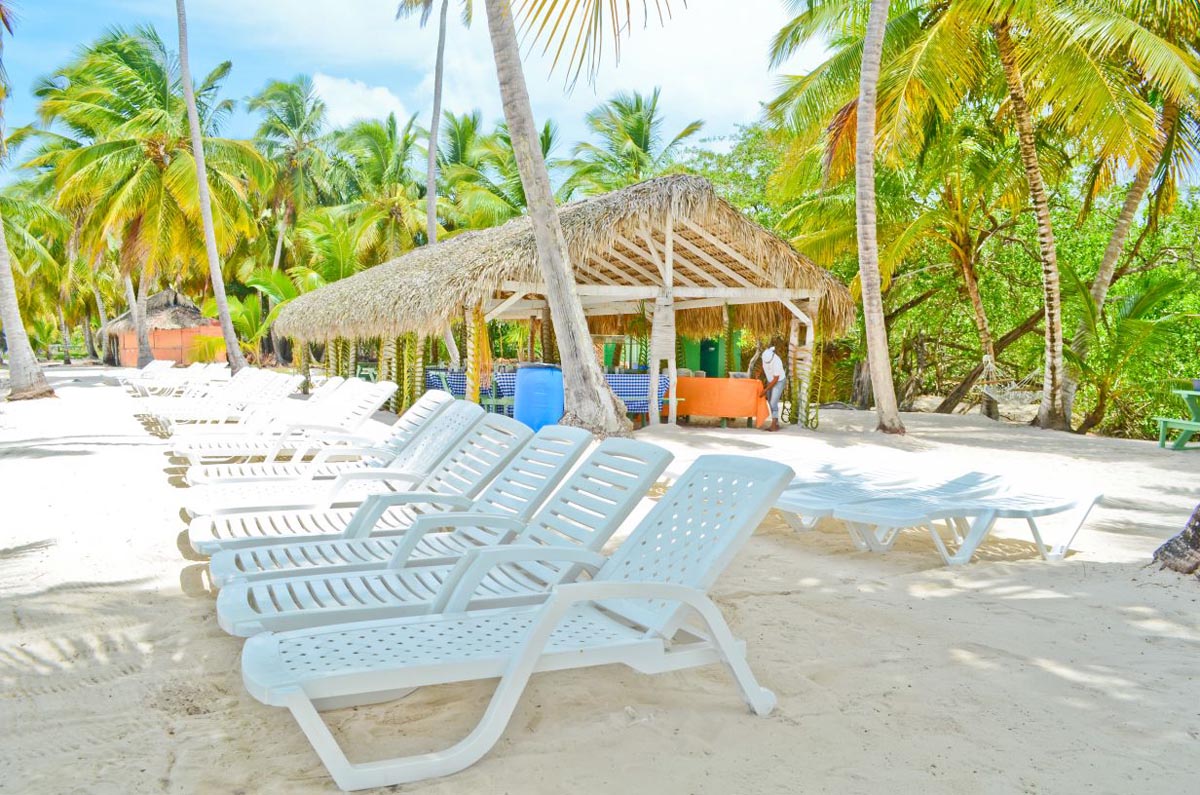 Relax on a lounge chair at the shaded beaches of Saona Island