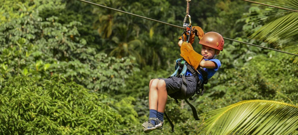 kid enjoying zip line